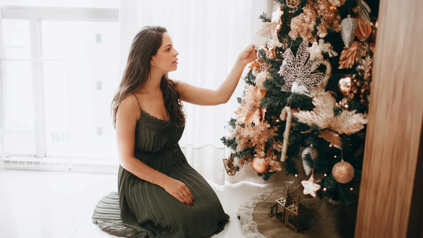 Stressed mom during holiday season managing kids, gifts and festive chaos