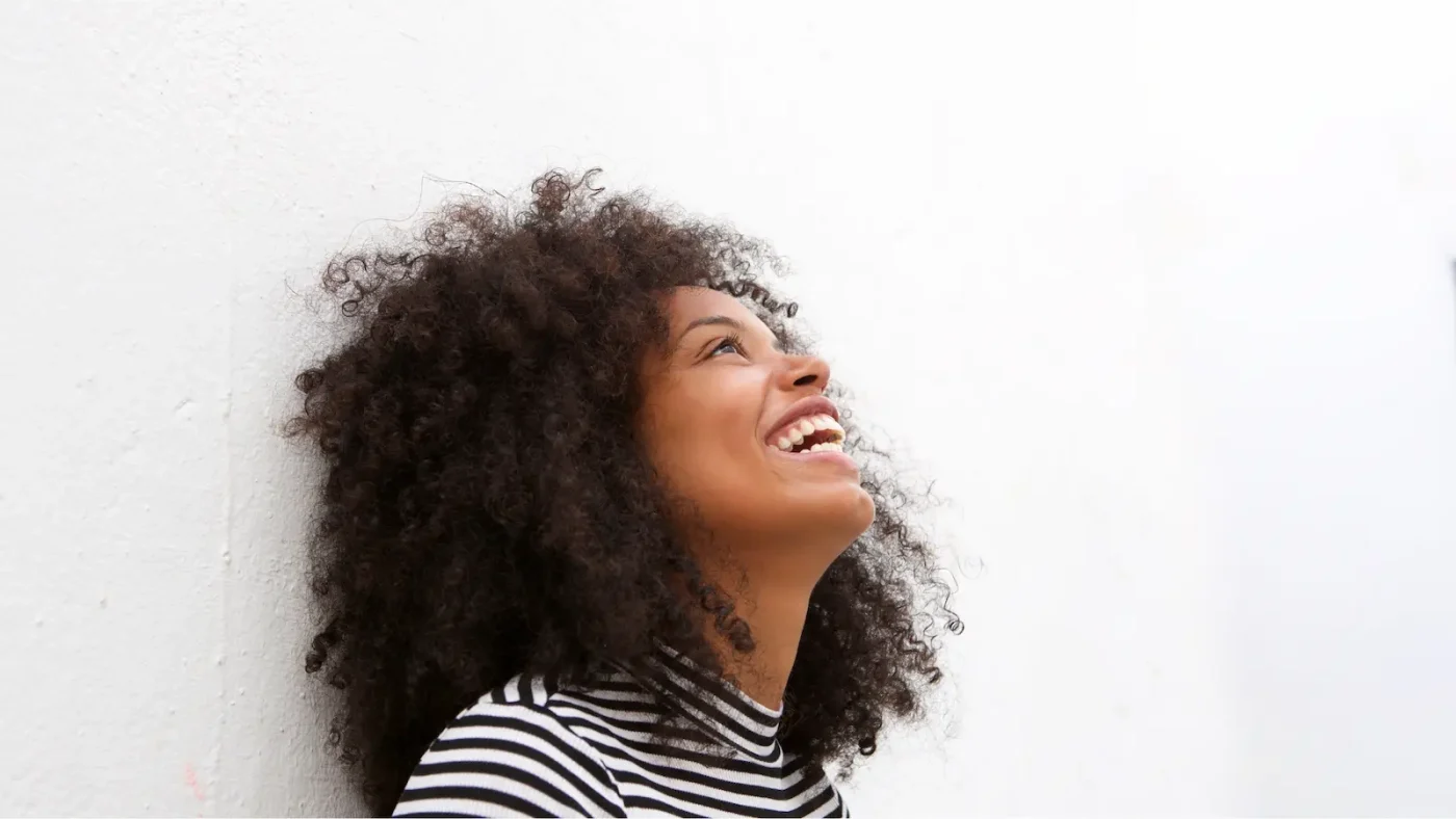 Confident working mom leading team with empathy and collaboration